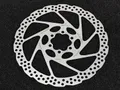 Диск тормозной Shimano 180мм SM-RT56-S
